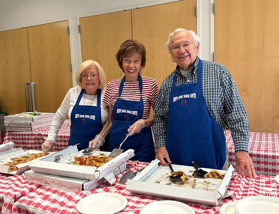 North Shore Senior Center members attending a Tuesday Club pizza night
